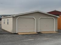 24' x 32' two-car modular garage with vinyl siding and upgraded flooring