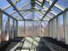 Inside an 8x12 greenhouse by Pine Creek Structures of Berlin